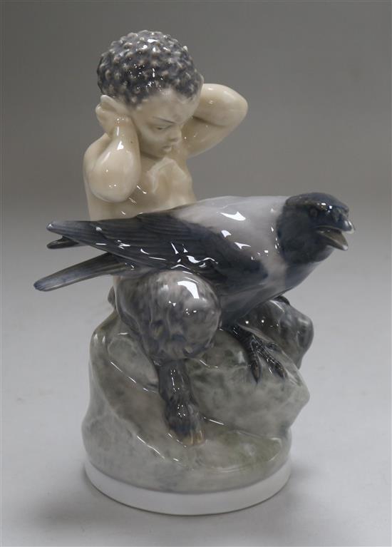 A Royal Copenhagen figure of a boy and a crow